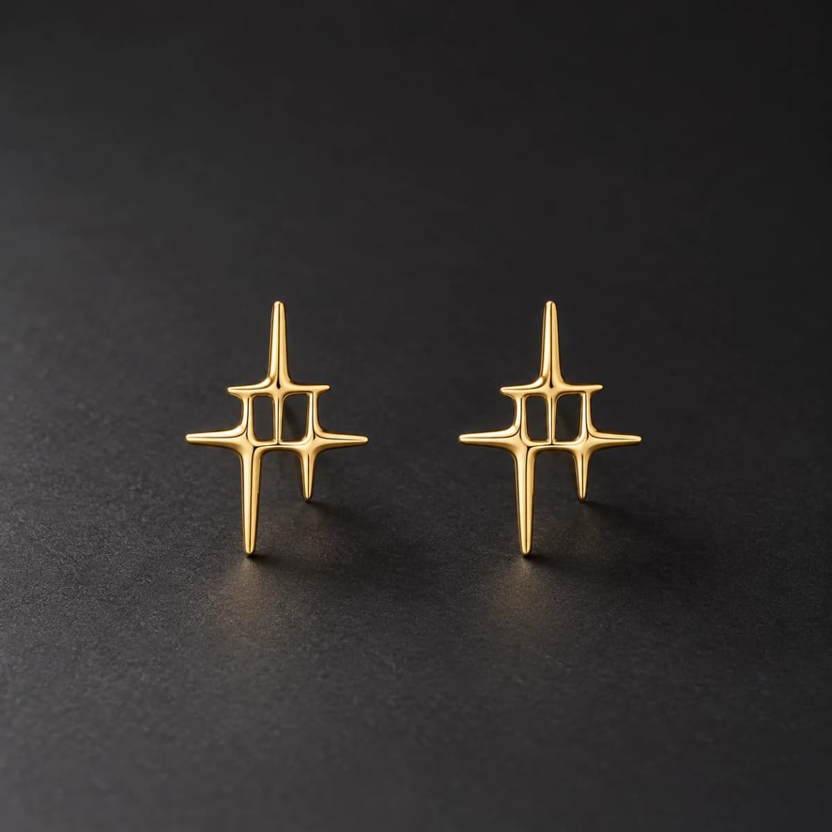 Gold-Tone Open Starburst Stud Earring Pair - Image 1